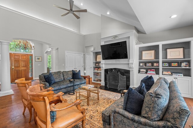 45 Shaker Ct, Guilford, CT 06437 - living area featuring decorative columns, ceiling fan, wood finished floors, arched walkways, and recessed lighting