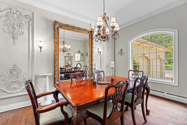 45 Shaker Ct, Guilford, CT 06437 - dining space featuring a chandelier, ornamental molding, and wood finished floors