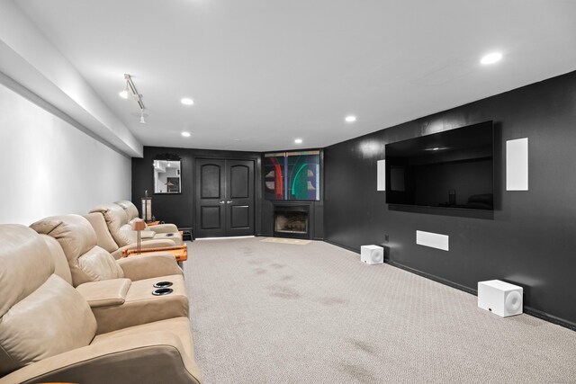 45 Shaker Ct, Guilford, CT 06437 - cinema room with carpet floors, a fireplace, and recessed lighting