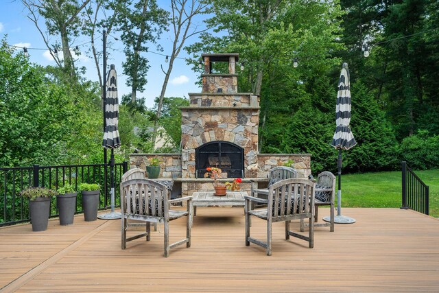 45 Shaker Ct, Guilford, CT 06437 - wooden deck featuring an outdoor stone fireplace