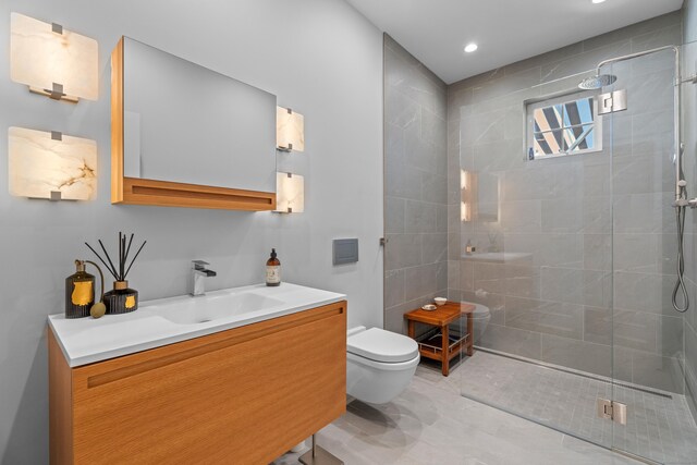 45 Shaker Ct, Guilford, CT 06437 - full bathroom featuring vanity, tiled shower, and recessed lighting