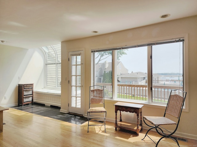 73 Harbour View Pl Unit 73, Stratford, CT 06615 - sitting room with plenty of natural light and wood finished floors
