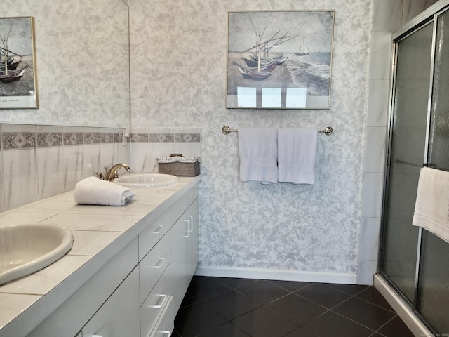 73 Harbour View Pl Unit 73, Stratford, CT 06615 - bathroom featuring tile patterned flooring, double vanity, a shower stall, and wallpapered walls