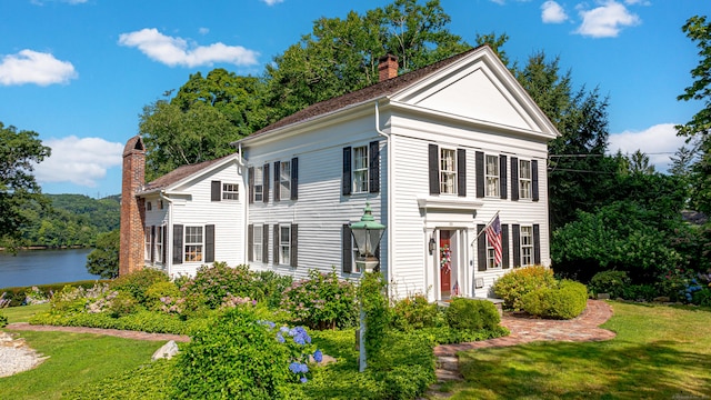 55 Main St, East Haddam, CT 06423 - neoclassical home featuring a chimney, a front yard, and a water view