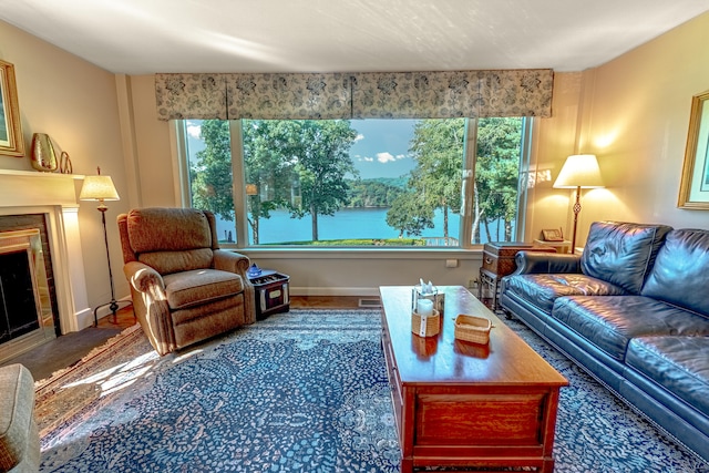 55 Main St, East Haddam, CT 06423 - living room featuring healthy amount of natural light and a fireplace