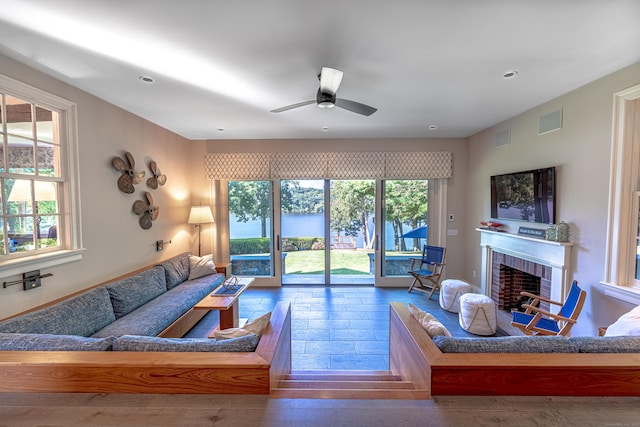 55 Main St, East Haddam, CT 06423 - living room featuring a fireplace, a ceiling fan, and recessed lighting