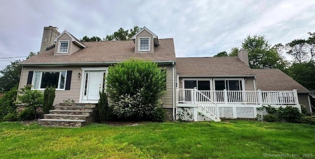 8 Breezy Knoll Ave, Wolcott, CT 06716 - view of front of house with a chimney, a front lawn, and a deck