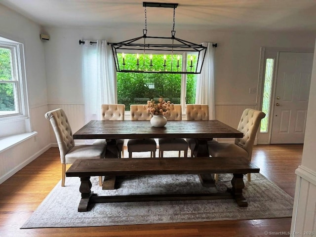 8 Breezy Knoll Ave, Wolcott, CT 06716 - dining area with a wainscoted wall and light wood-type flooring