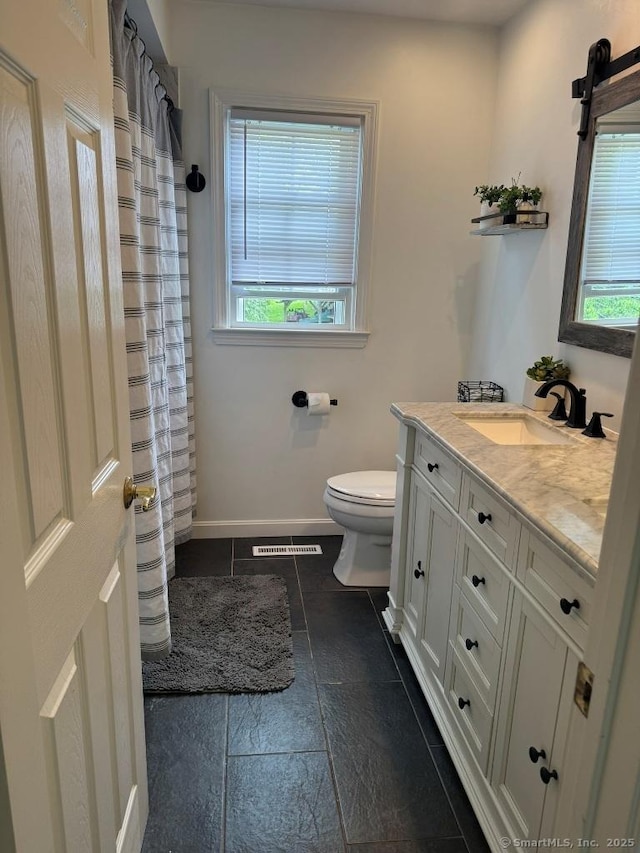 8 Breezy Knoll Ave, Wolcott, CT 06716 - bathroom featuring vanity, plenty of natural light, tile patterned floors, and a shower with shower curtain