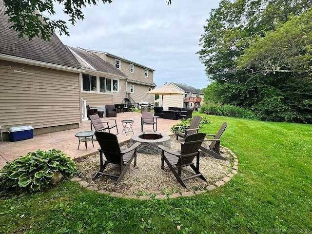 8 Breezy Knoll Ave, Wolcott, CT 06716 - view of patio featuring an outdoor fire pit
