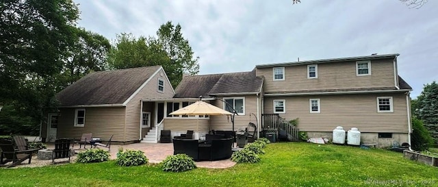 8 Breezy Knoll Ave, Wolcott, CT 06716 - rear view of property with an outdoor fire pit, a patio area, and a lawn
