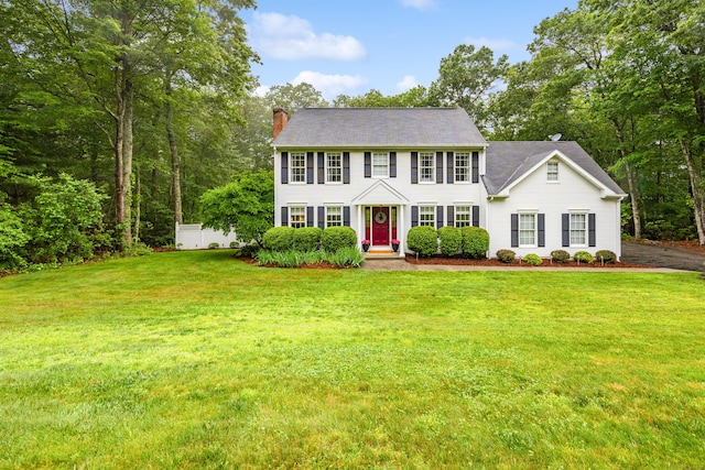 5 Goldfinch Ter, East Lyme, CT 06333 - colonial home with a chimney and a front yard