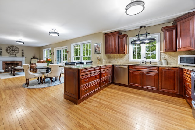 5 Goldfinch Ter, East Lyme, CT 06333 - kitchen featuring appliances with stainless steel finishes, healthy amount of natural light, and backsplash