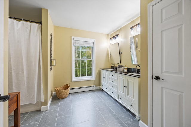 5 Goldfinch Ter, East Lyme, CT 06333 - full bathroom featuring a baseboard radiator, double vanity, and tile patterned floors