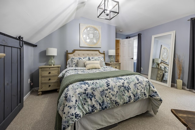 5 Goldfinch Ter, East Lyme, CT 06333 - carpeted bedroom with a barn door, lofted ceiling, and a chandelier