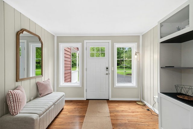 1027 Monroe Tpke, Monroe, CT 06468 - entrance foyer featuring plenty of natural light, light wood finished floors, and ornamental molding