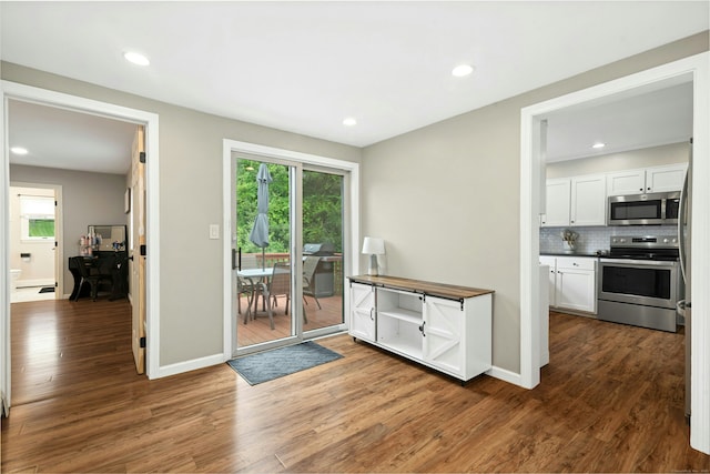 1027 Monroe Tpke, Monroe, CT 06468 - entryway with dark wood-style floors and recessed lighting