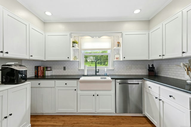 1027 Monroe Tpke, Monroe, CT 06468 - kitchen with stainless steel dishwasher, open shelves, backsplash, white cabinets, and ornamental molding
