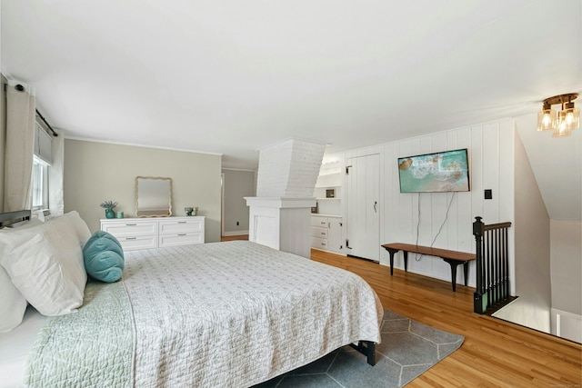 1027 Monroe Tpke, Monroe, CT 06468 - bedroom featuring wood finished floors and a chandelier