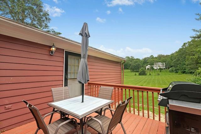 1027 Monroe Tpke, Monroe, CT 06468 - wooden deck with outdoor dining area, grilling area, and a lawn