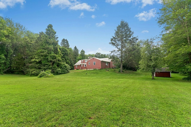 1027 Monroe Tpke, Monroe, CT 06468 - view of grassy yard featuring a storage shed