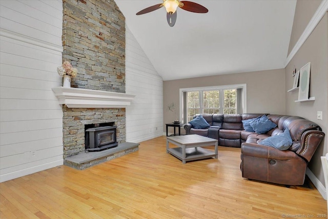 97 Cherry Swamp Rd, East Haddam, CT 06469 - living area featuring a ceiling fan, wood finished floors, a wood stove, and high vaulted ceiling