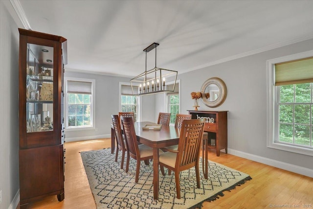 97 Cherry Swamp Rd, East Haddam, CT 06469 - dining space featuring a chandelier, ornamental molding, and light wood finished floors