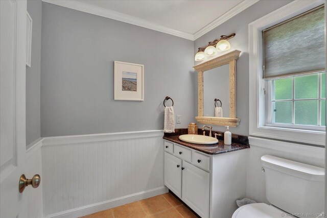 97 Cherry Swamp Rd, East Haddam, CT 06469 - bathroom featuring vanity, wainscoting, ornamental molding, and tile patterned flooring