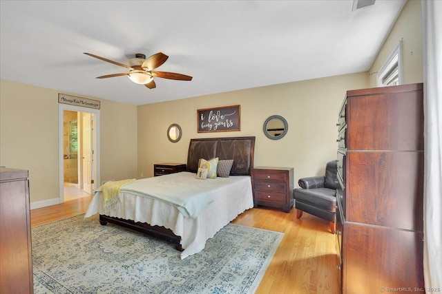 97 Cherry Swamp Rd, East Haddam, CT 06469 - bedroom featuring light wood-style flooring, ceiling fan, and connected bathroom