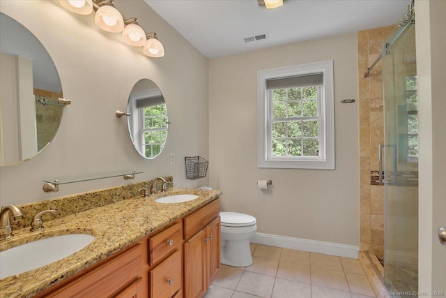 97 Cherry Swamp Rd, East Haddam, CT 06469 - bathroom with healthy amount of natural light, a stall shower, double vanity, and tile patterned flooring