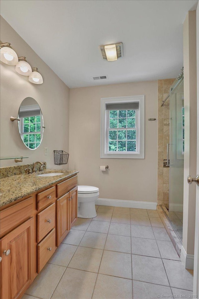 97 Cherry Swamp Rd, East Haddam, CT 06469 - full bath with plenty of natural light, vanity, a shower stall, and tile patterned flooring