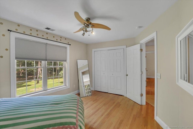 97 Cherry Swamp Rd, East Haddam, CT 06469 - bedroom featuring light wood-style floors, a ceiling fan, and a closet