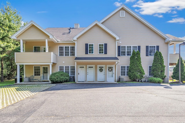 663 W Ave Unit A24, Milford, CT 06461 - multi unit property featuring covered porch and a chimney
