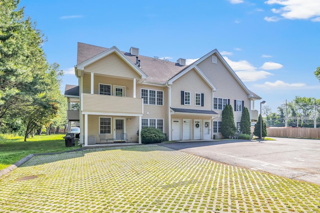 663 W Ave Unit A24, Milford, CT 06461 - view of property featuring driveway and an attached garage