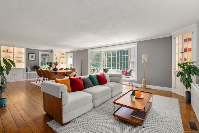 56 Turtleback Rd, Wilton, CT 06897 - living area featuring crown molding and wood finished floors
