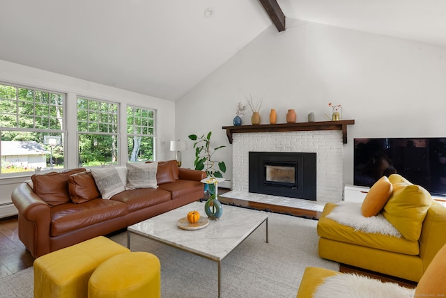 56 Turtleback Rd, Wilton, CT 06897 - living room with beam ceiling, wood finished floors, a fireplace, and high vaulted ceiling