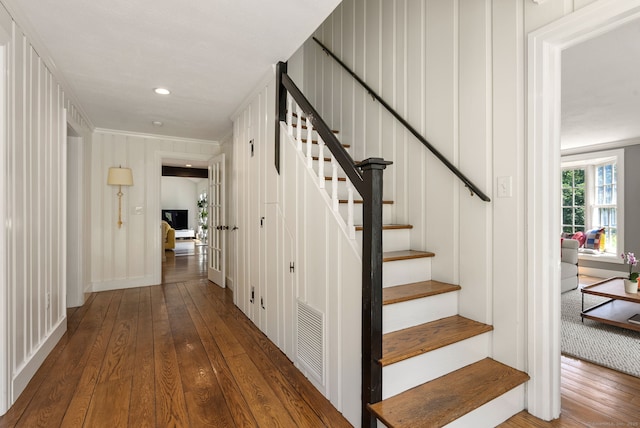 56 Turtleback Rd, Wilton, CT 06897 - stairs featuring hardwood / wood-style flooring, recessed lighting, and crown molding