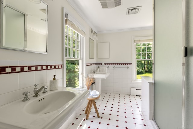 56 Turtleback Rd, Wilton, CT 06897 - full bathroom with tile walls, healthy amount of natural light, crown molding, a shower stall, and tile patterned flooring