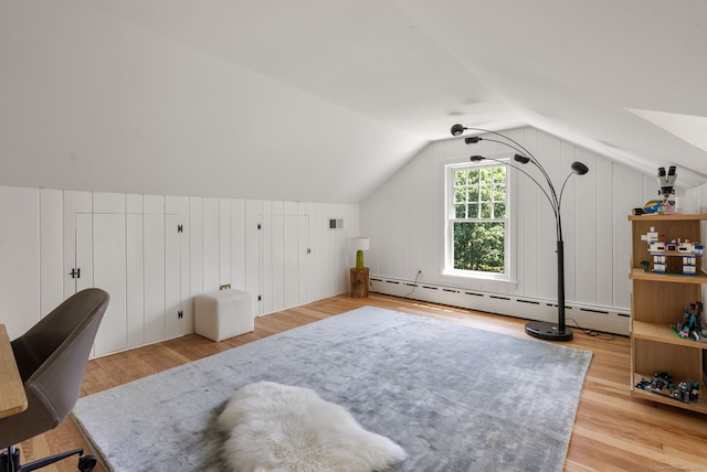 56 Turtleback Rd, Wilton, CT 06897 - bonus room with a baseboard heating unit, wood finished floors, and vaulted ceiling