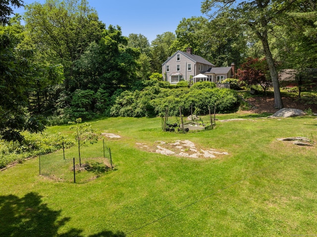 56 Turtleback Rd, Wilton, CT 06897 - view of grassy yard featuring a garden