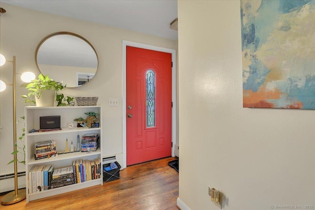118 W Hartford Rd, Newington, CT 06111 - foyer entrance featuring a baseboard radiator and wood finished floors