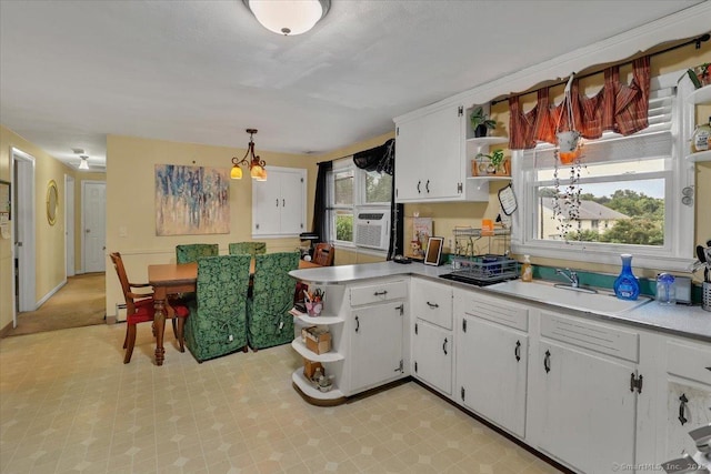 118 W Hartford Rd, Newington, CT 06111 - kitchen with open shelves, white cabinetry, light countertops, and light flooring