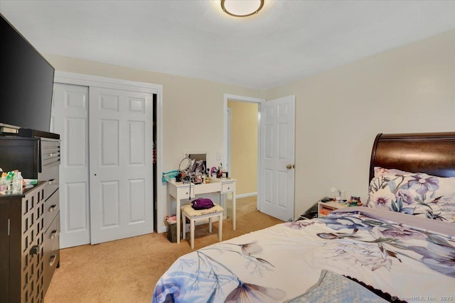 118 W Hartford Rd, Newington, CT 06111 - bedroom featuring light carpet and a closet