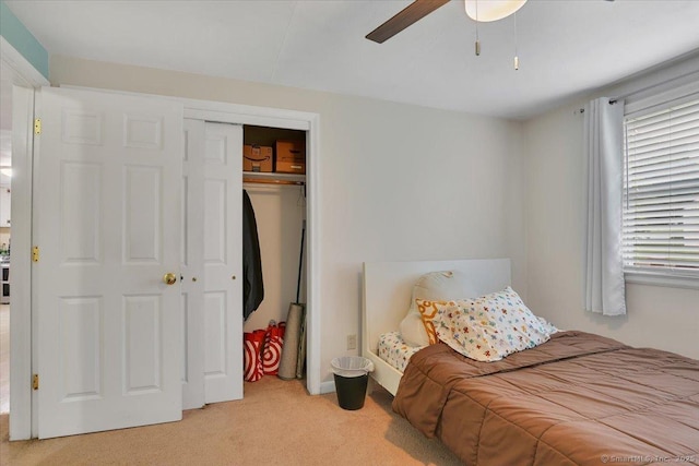 118 W Hartford Rd, Newington, CT 06111 - bedroom featuring light carpet, a closet, and a ceiling fan