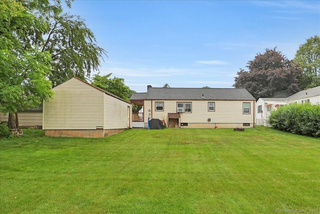 118 W Hartford Rd, Newington, CT 06111 - back of house with a yard and a chimney