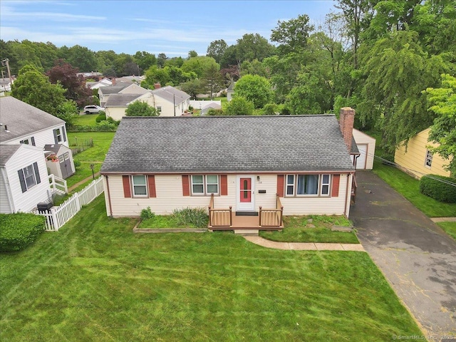 118 W Hartford Rd, Newington, CT 06111 - view of front of house featuring a deck, a chimney, roof with shingles, and an outdoor structure