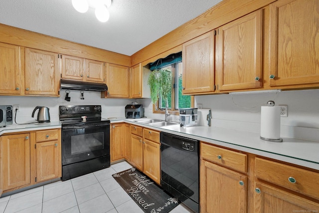 17 Landing Cir, Windsor, CT 06095 - kitchen with black appliances, under cabinet range hood, light countertops, light tile patterned flooring, and a textured ceiling