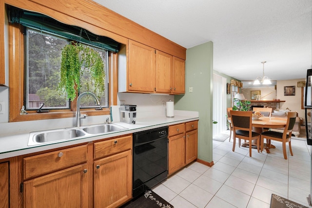 17 Landing Cir, Windsor, CT 06095 - kitchen featuring black dishwasher, light countertops, hanging light fixtures, light tile patterned floors, and a chandelier