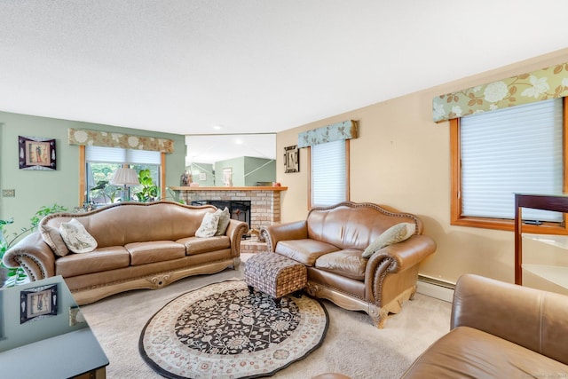 17 Landing Cir, Windsor, CT 06095 - carpeted living room featuring a baseboard radiator and a brick fireplace
