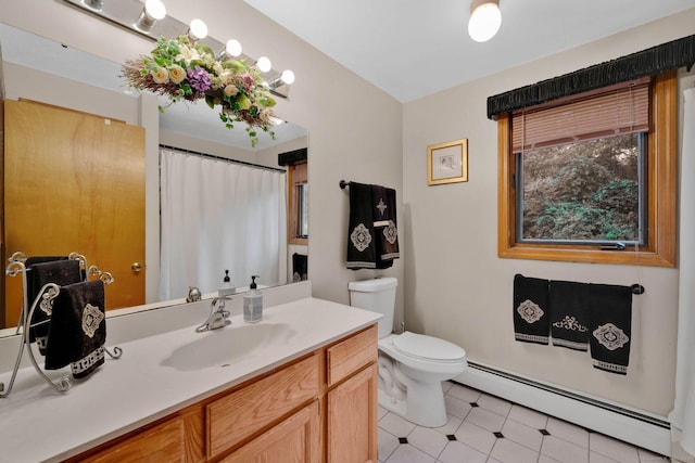 17 Landing Cir, Windsor, CT 06095 - bathroom with a baseboard heating unit, vanity, curtained shower, and tile patterned flooring